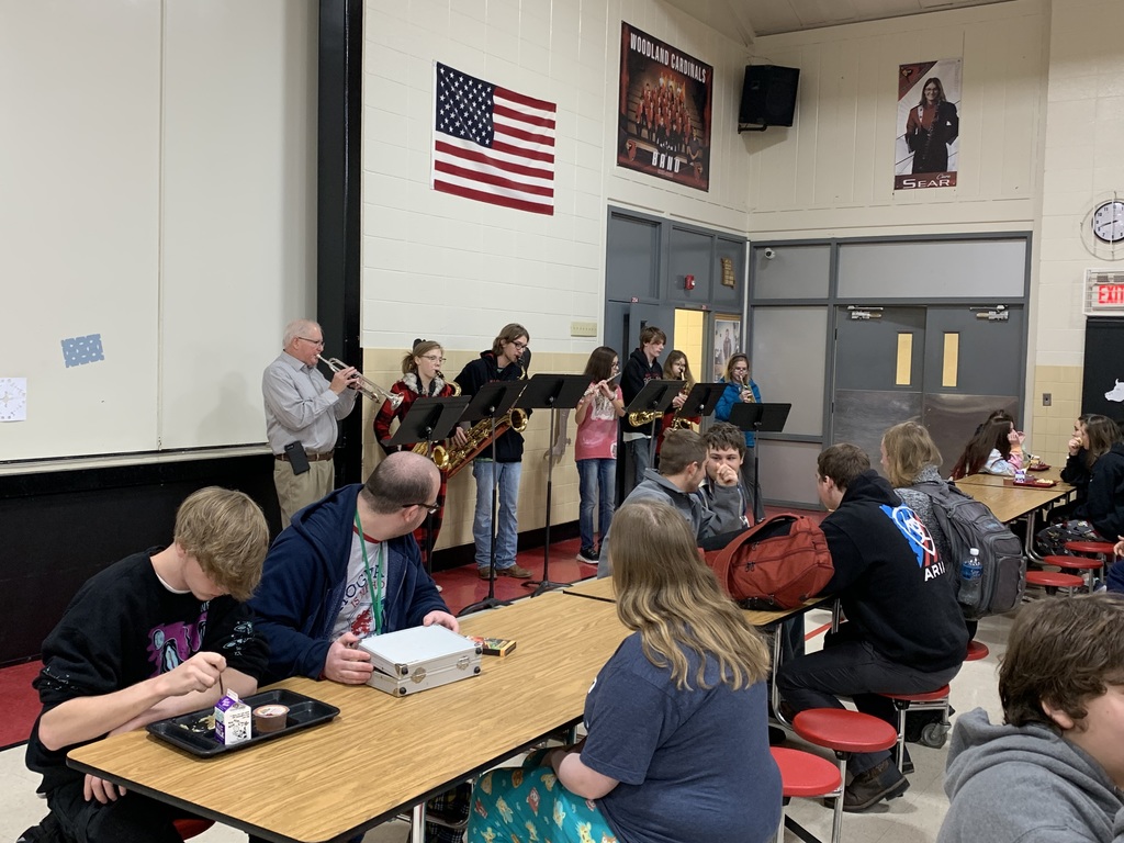 HS band playing Christmas songs during breakfast
